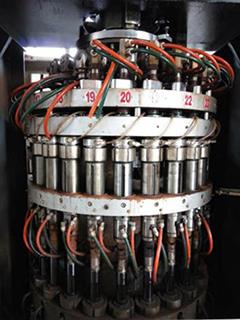 High capacity cap compression molding machine.